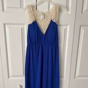 Sleeveless blue, vneck dress with lace details on back and shoulders